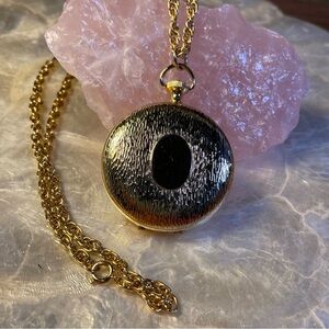 Elegant Gold and Black Pendant Necklace